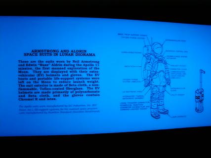 Info board for Armstrong and Aldrin space suits in lunar diorama<br>Location: <a href="https://www.google.com/maps/search/?api=1&query=38.88814,-77.01985" target="_new">Smithsonian National Air and Space Museum</a>